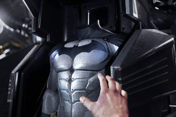 Batman suiting up in Batman: Arkham VR